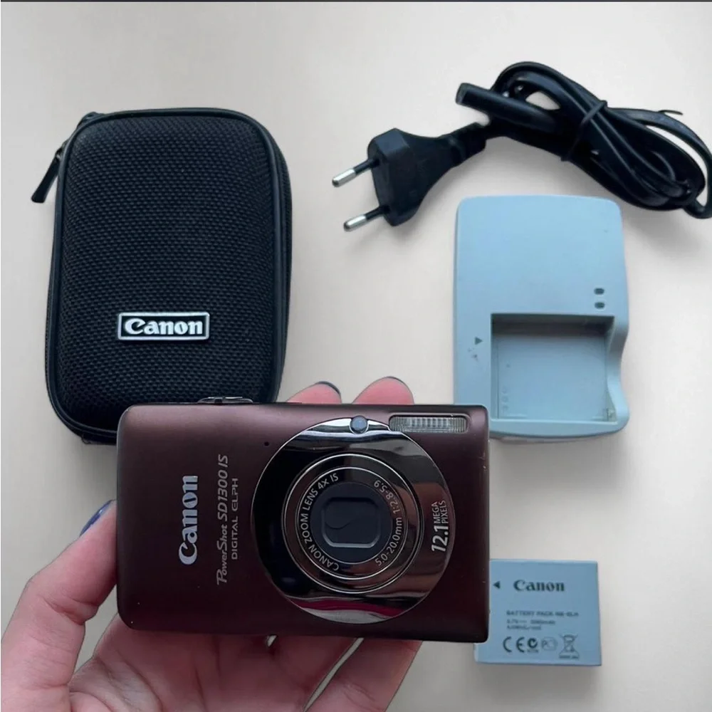 Canon Powershot SD1300 IS Elph burgundy Camera w Battery, Case, Charger tested